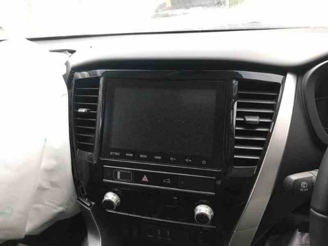 Mitsubishi Pajero Sport KS1 Stereo Surround / Bezel
